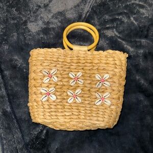 Rattan Type Purse With Crossbody Strap and Shell Detail